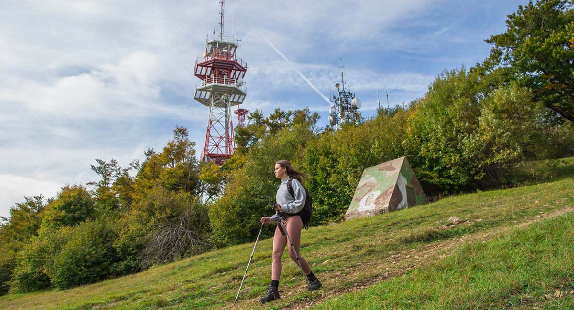 A hiker on the trail from Mount Krim. A radio transmitter in the background.
