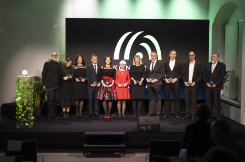 peope with awards standing on stage