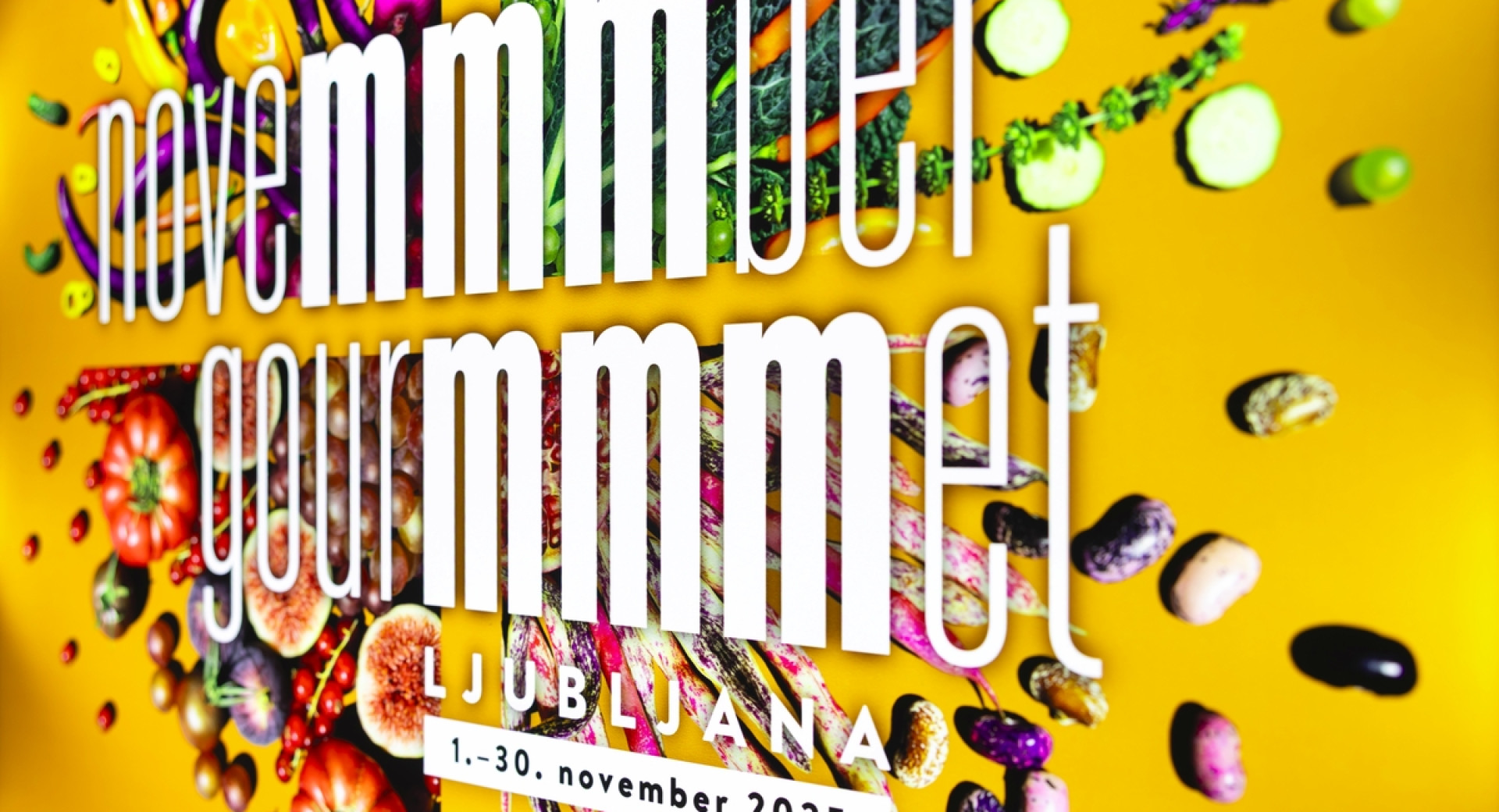Promocijski plakat z napisom Novemmmber Gourmmmet Ljubljana.