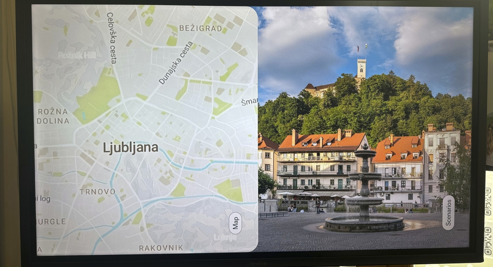 Zaslon z zemljevidom in fotografijo Ljubljane