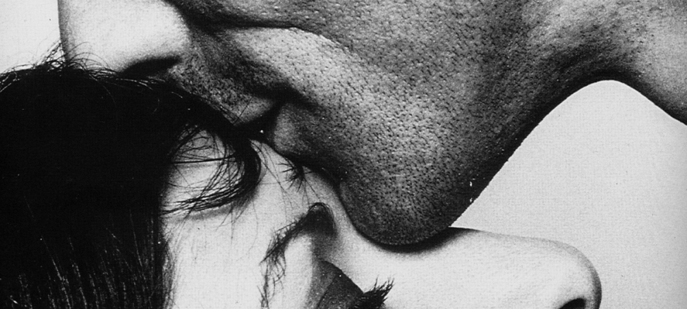 Faces of two people in black-and-white.