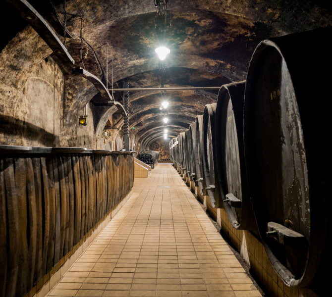 Large barrels in a wine cellar.