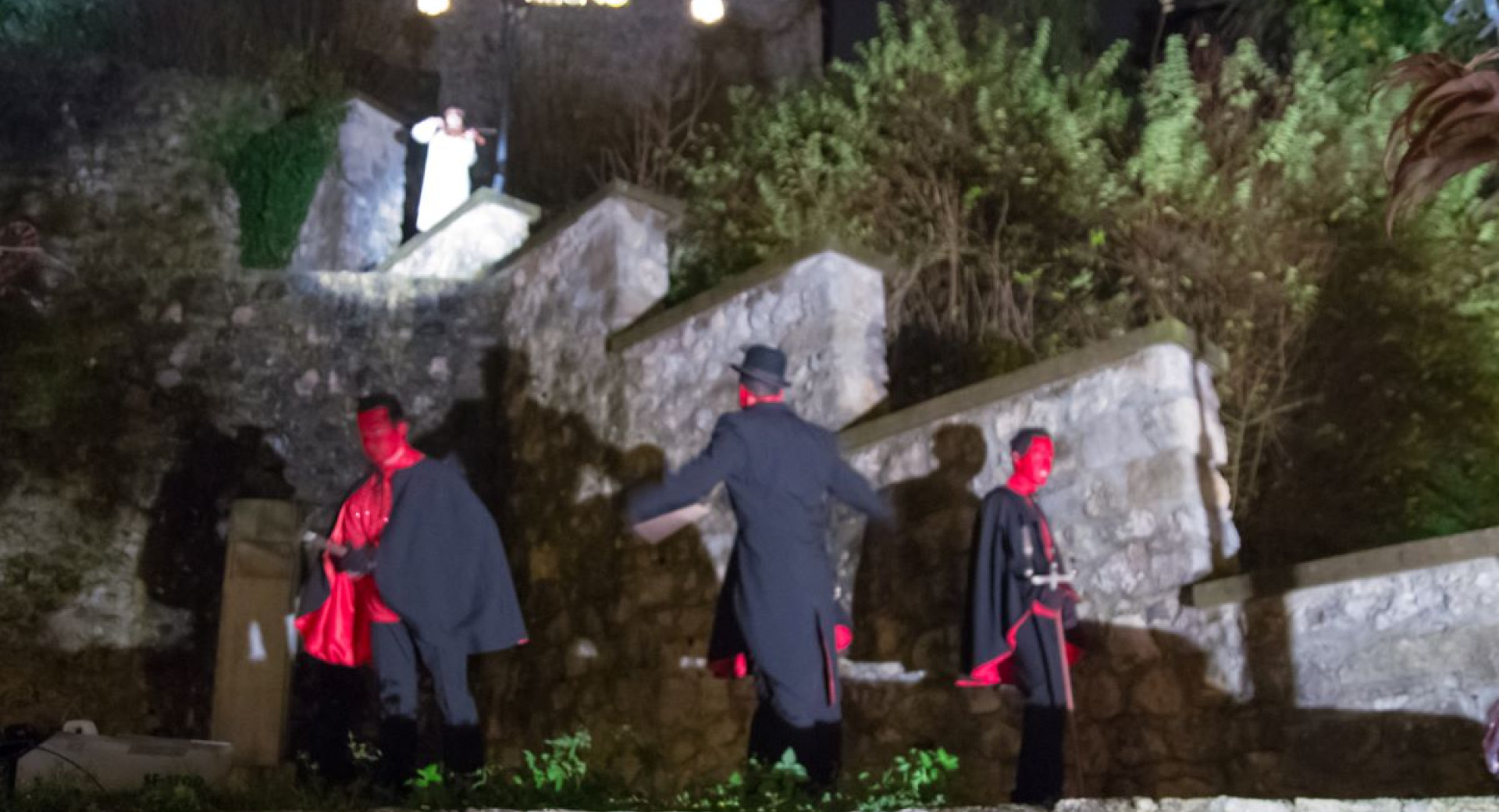 The Parkeln (or Krampus-like figures) perform outdoors during the St. Nicholas celebrations.