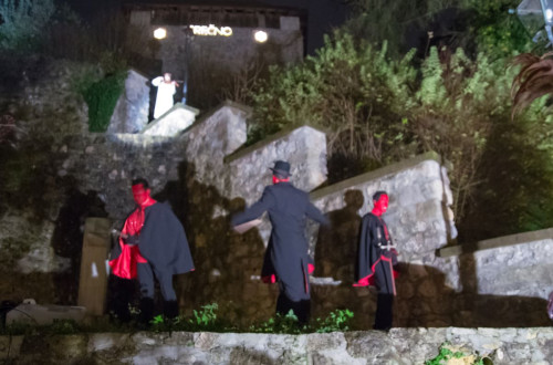 The Parkeln (or Krampus-like figures) perform outdoors during the St. Nicholas celebrations.