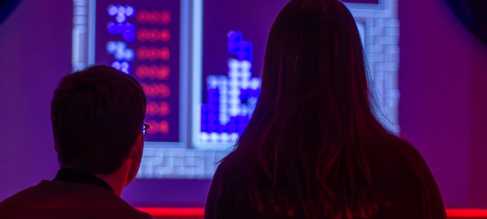 Man and woman looking at a computer screen.