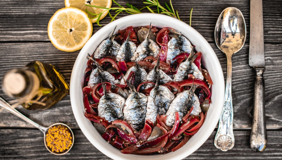Fish on a plate on a table.