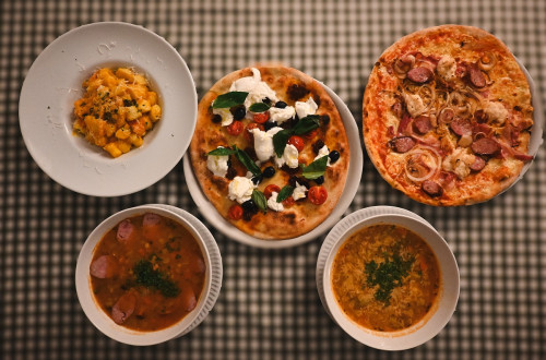 Five plates full of food.