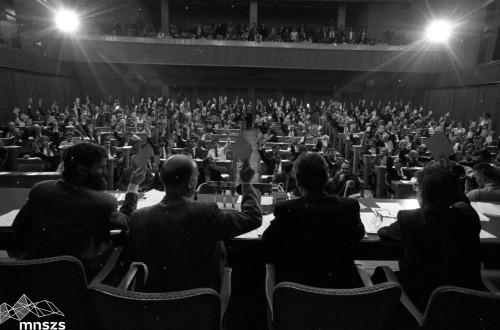 A black-and-white photograph of the interior of the National Assembly, filled with people.