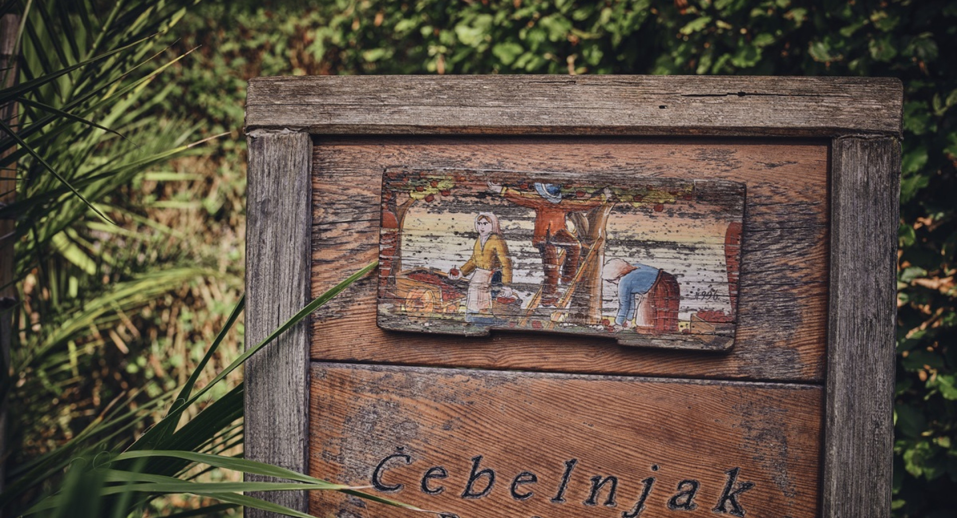 A wooden beehive panel.