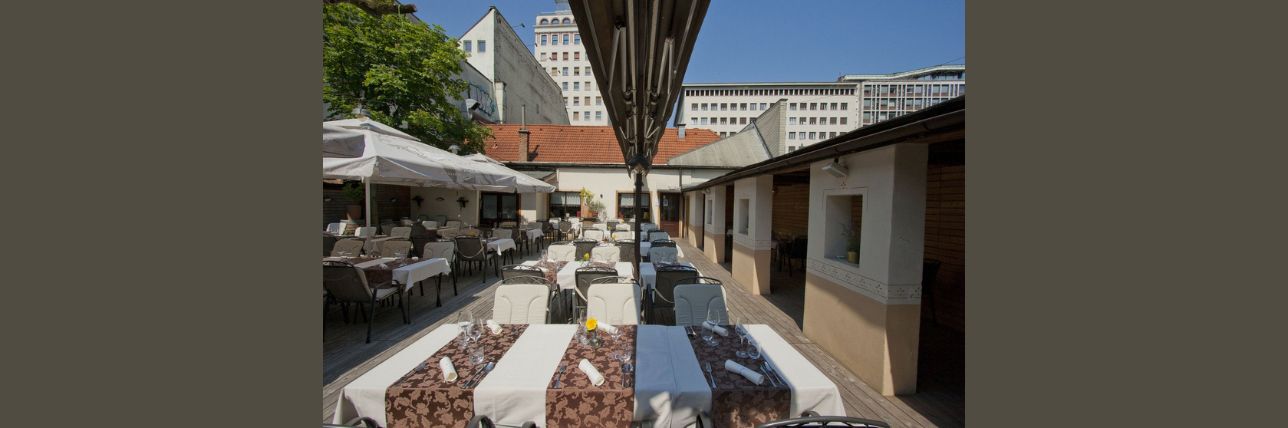 the terrace of the restaurant on a beautiful sunny day