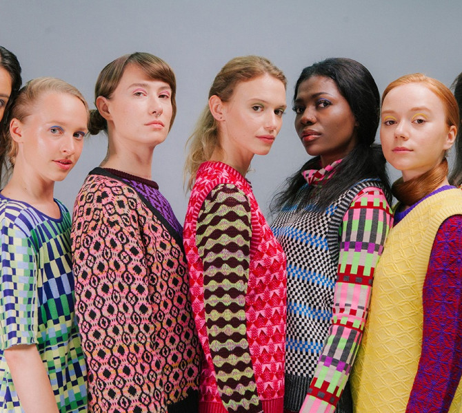 Women in colourful pulovers with different patterns.