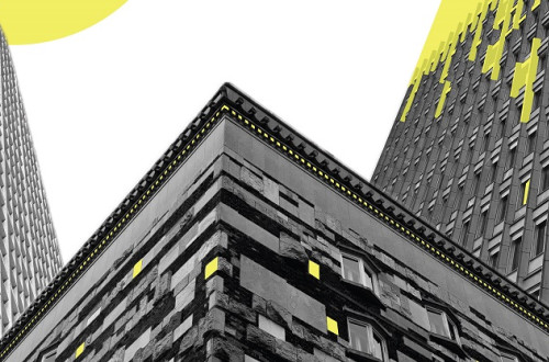 A view of three buildings from below.