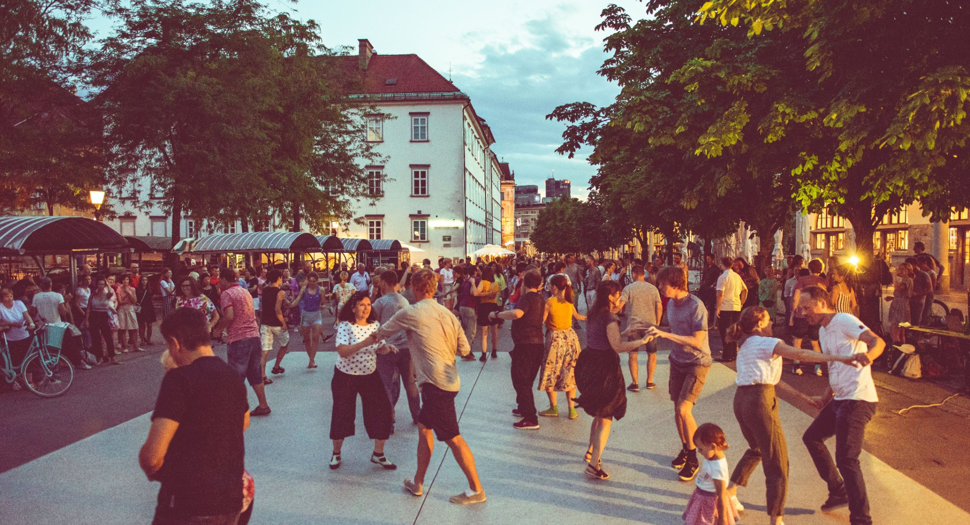 People dancing on the street.