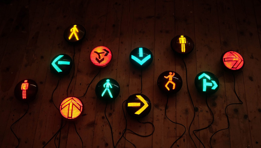 Brown background with various traffic light signals.