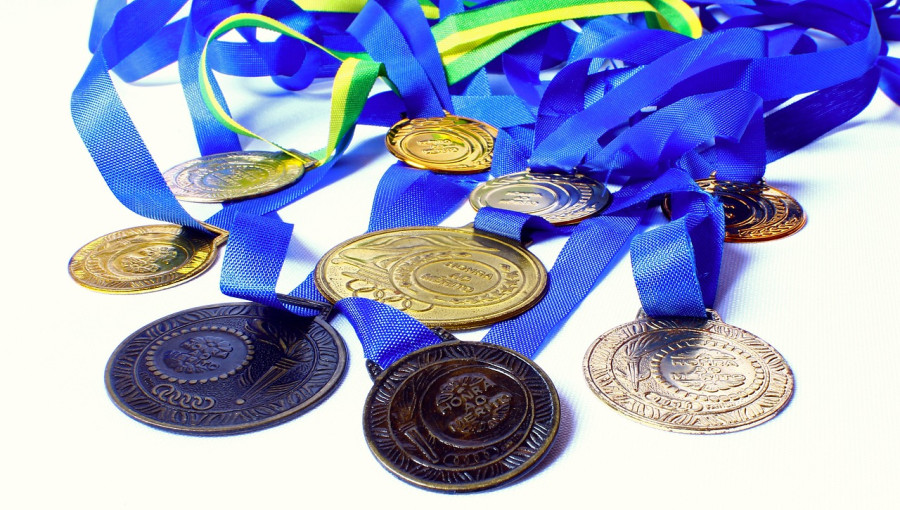 Silver, gold and bronze medals.