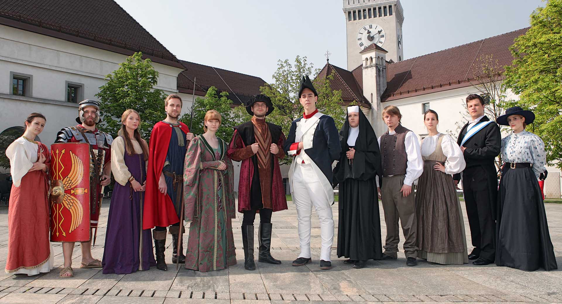 Guides at the castle dressed in different costumes.