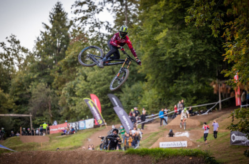 A cyclist jumping in the air.