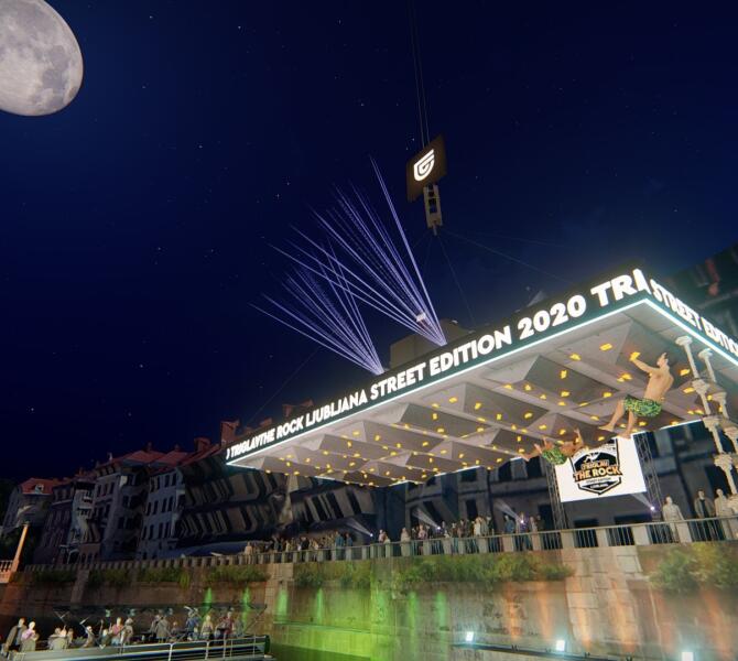 Night event at The Rock Ljubljana 2020 with climbers on an illuminated structure above the Ljubljanica River, under a starlit sky.