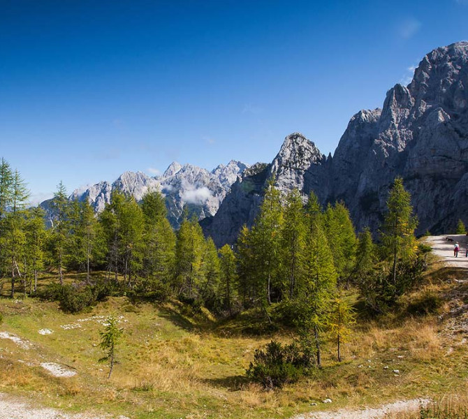 The most famous pass in Slovenia, with mountain peaks in the background.