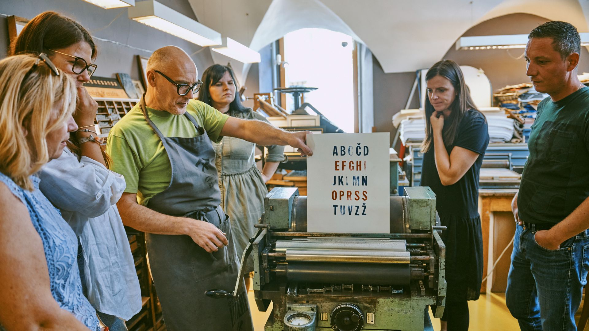 Print your own poster in an old print shop visit ljubljana
