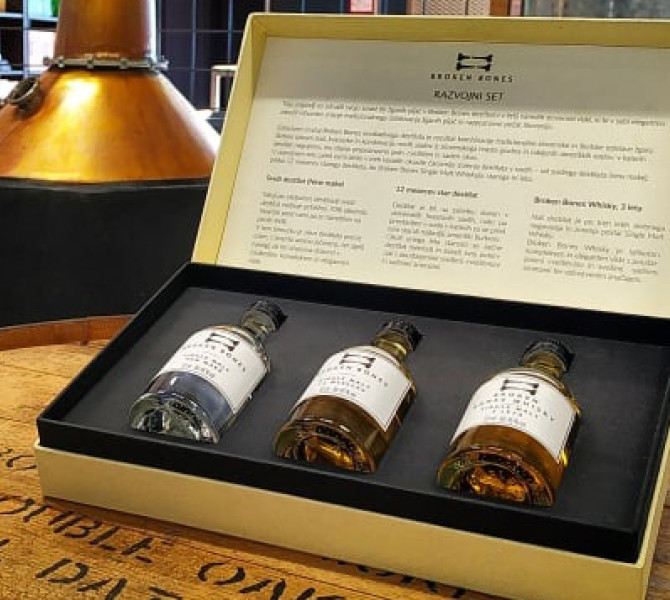 Three bottles of whisky in a gift box.